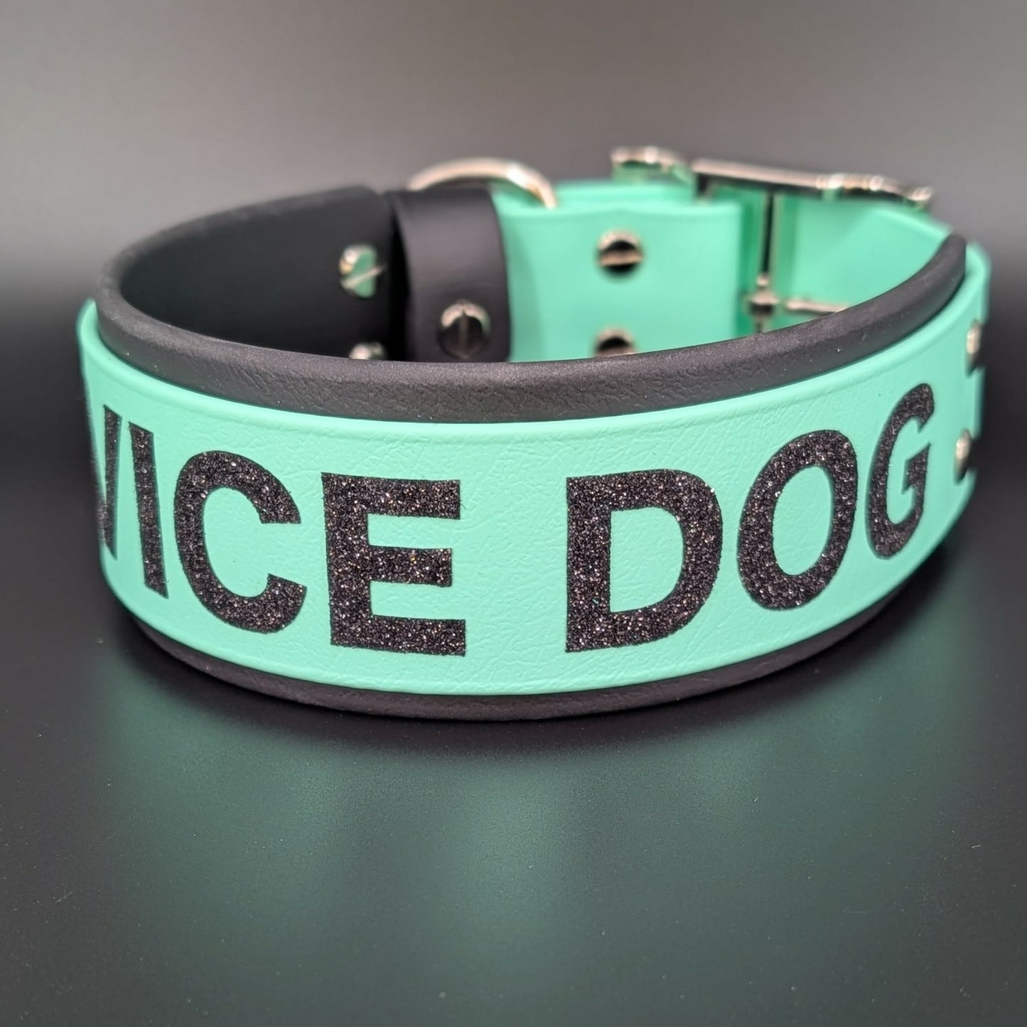 2 inch wide black and mint green layered biothane dog collar with custom service dog text