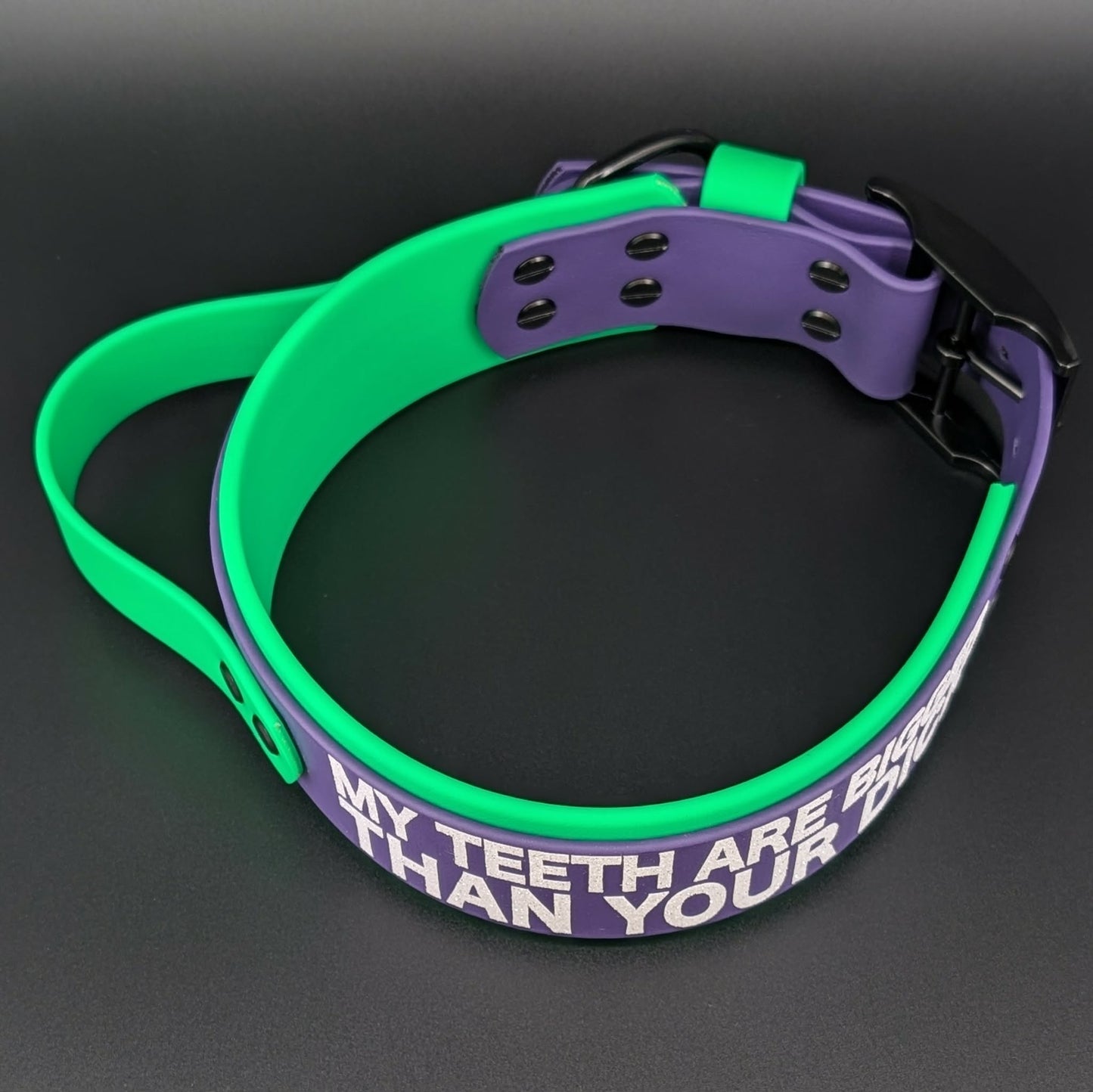 2 inch wide green and purple layered biothane handle collar with glitter my teeth are bigger than your dick text