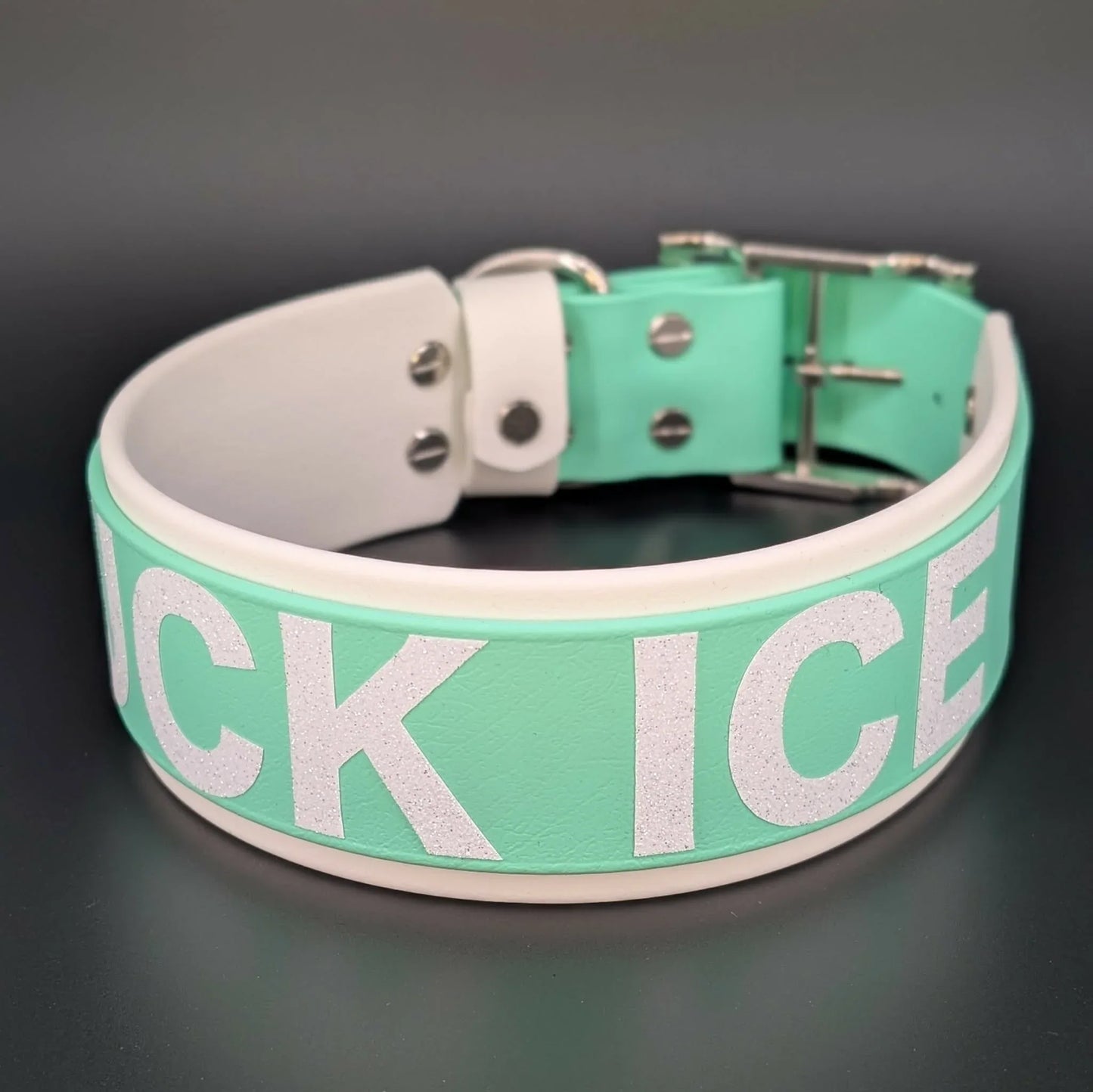 2 inch wide white and mint green layered biothane dog collar with fuck ice text in white glitter
