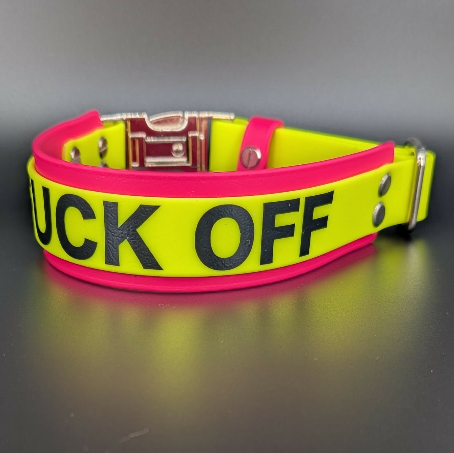 layered pink and yellow biothane collar with fuck off text