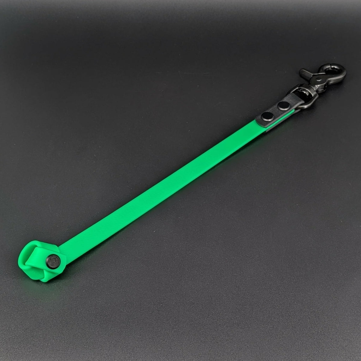 light green and black biothane knotted traffic tab for dog training
