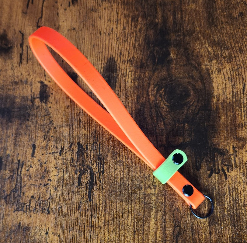 orange and light green biothane e-collar remote wrist strap