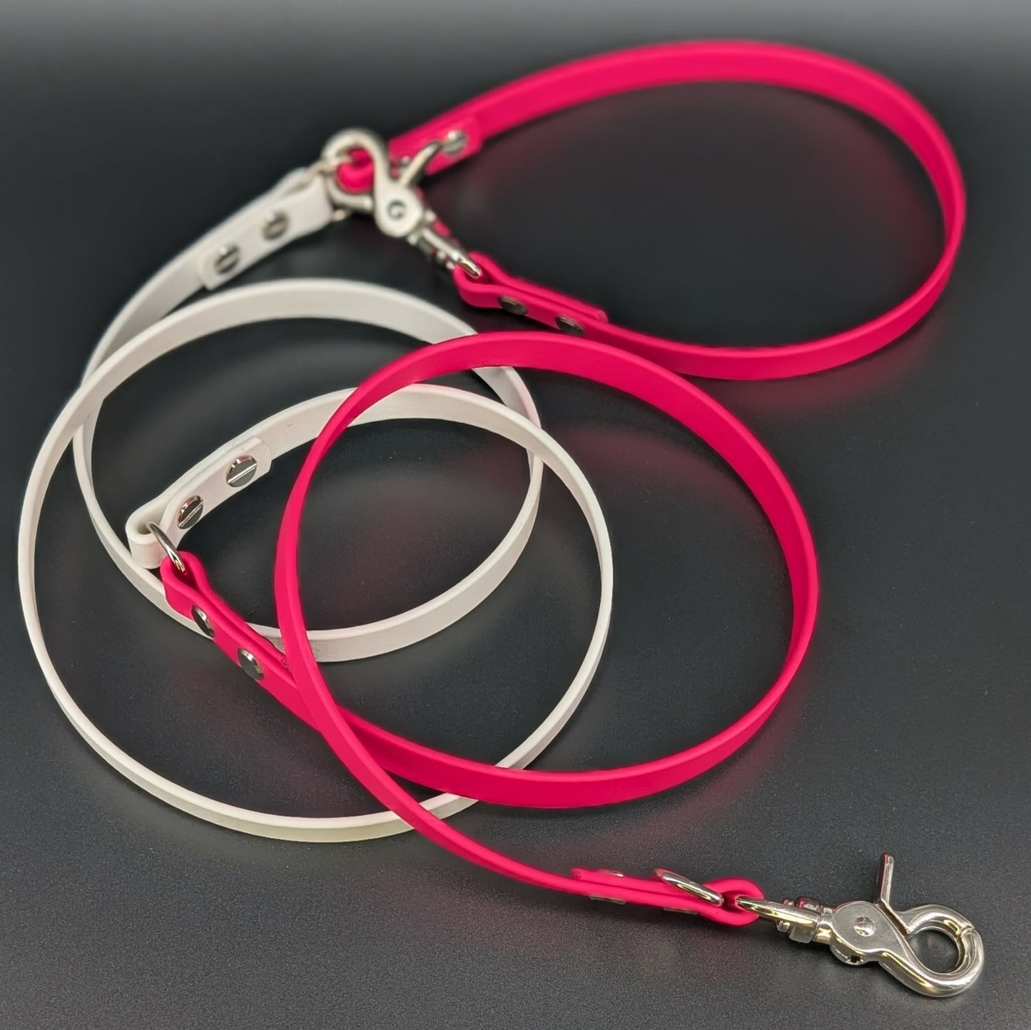 pink and white biothane over the shoulder hands free leash