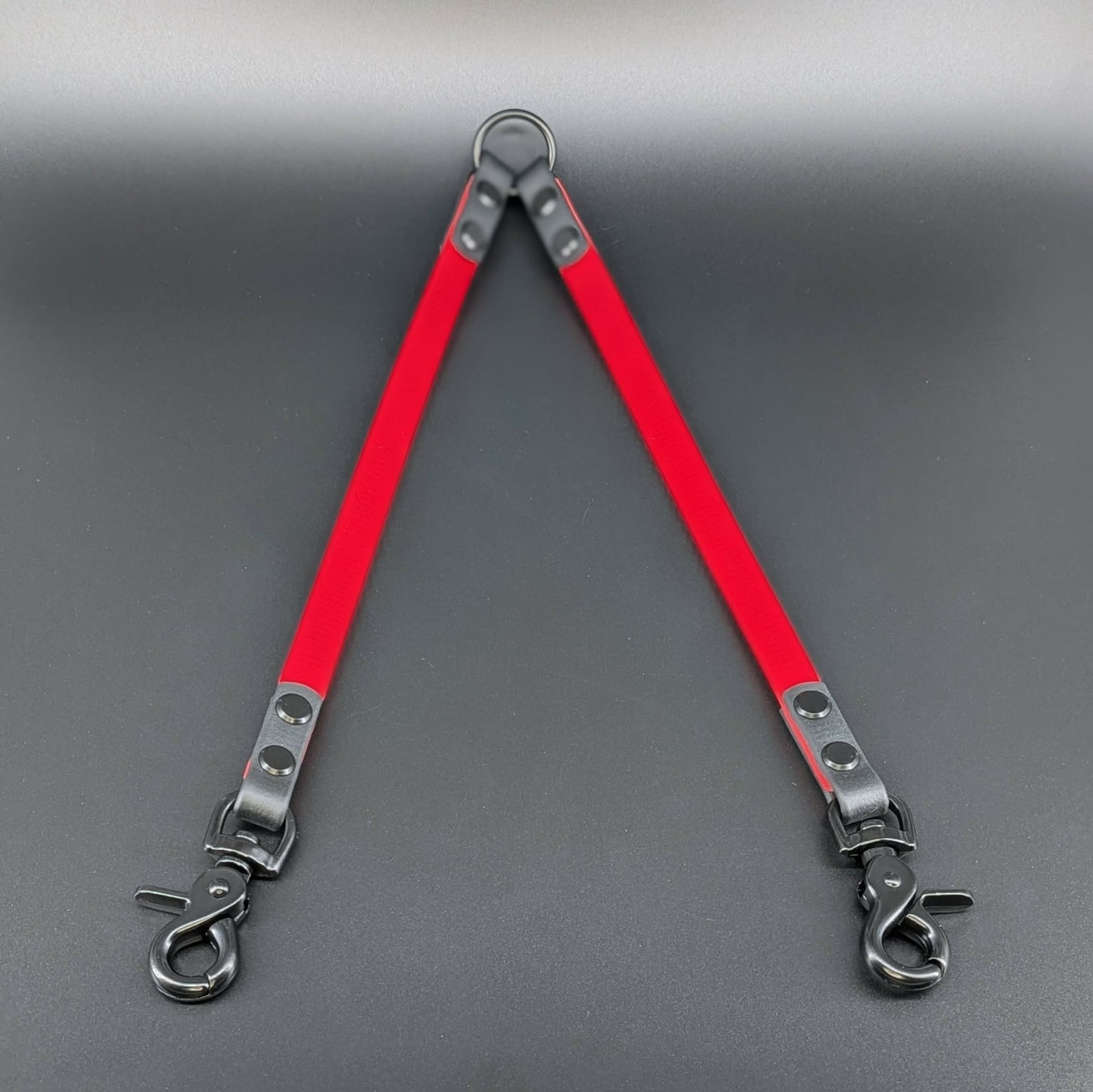 red and black biothane dog leash coupler