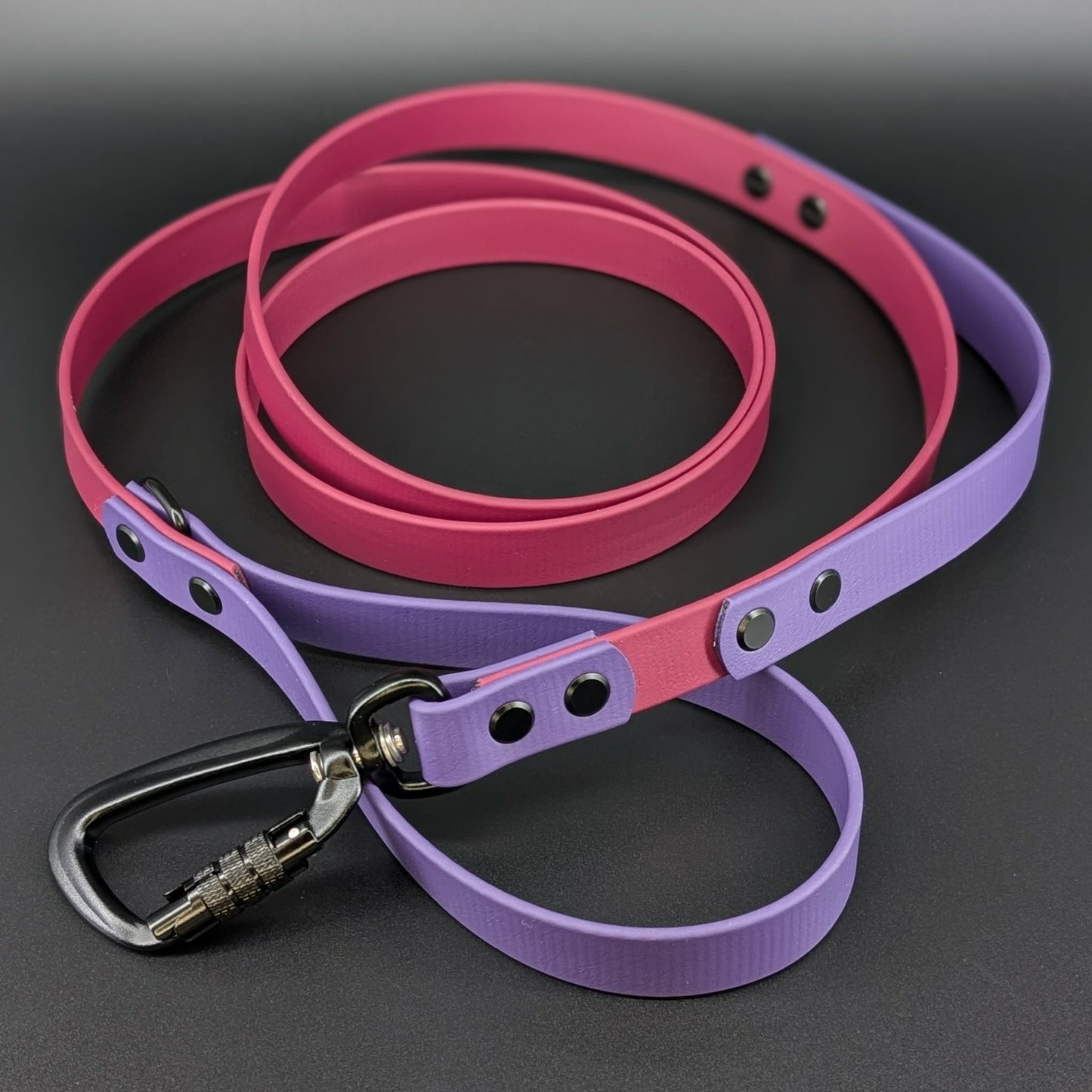 wine and dark purple biothane dog leash with traffic handle and auto locking carabiner clip that twists to unlock and open