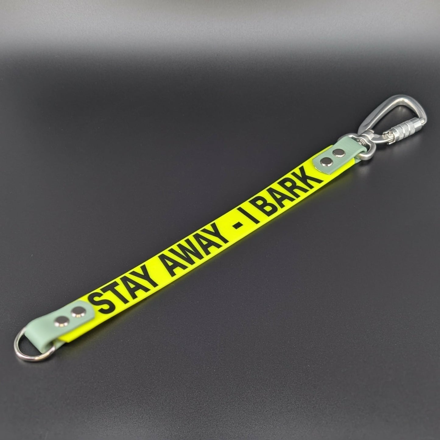 yellow and sage green biothane leash extender with stay away I bark text and silver carabiner clip