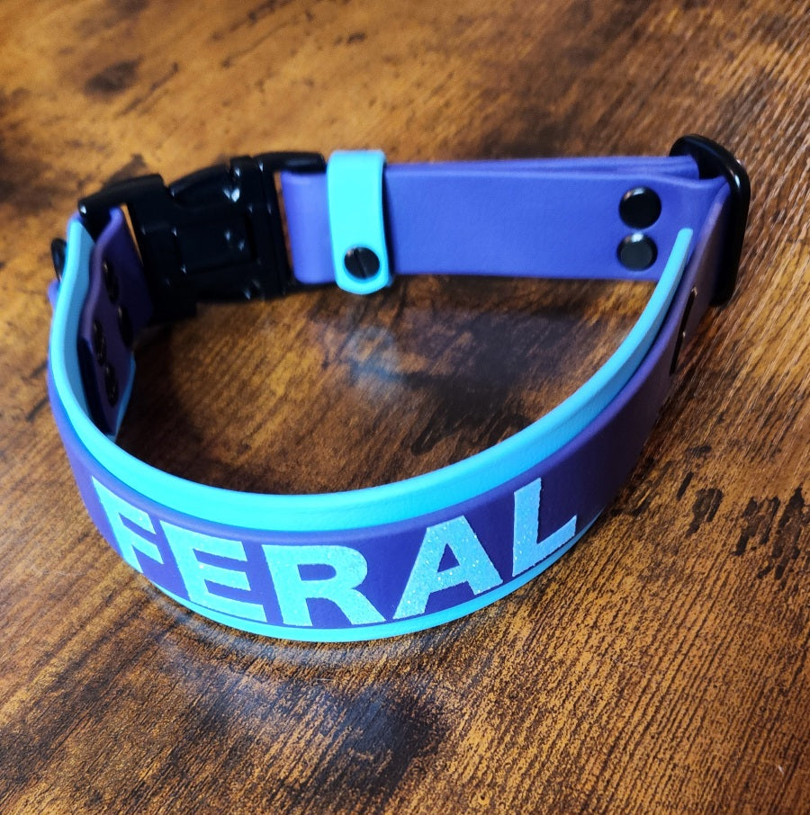 ready to ship layered biothane dog collar with text reading 'feral'
