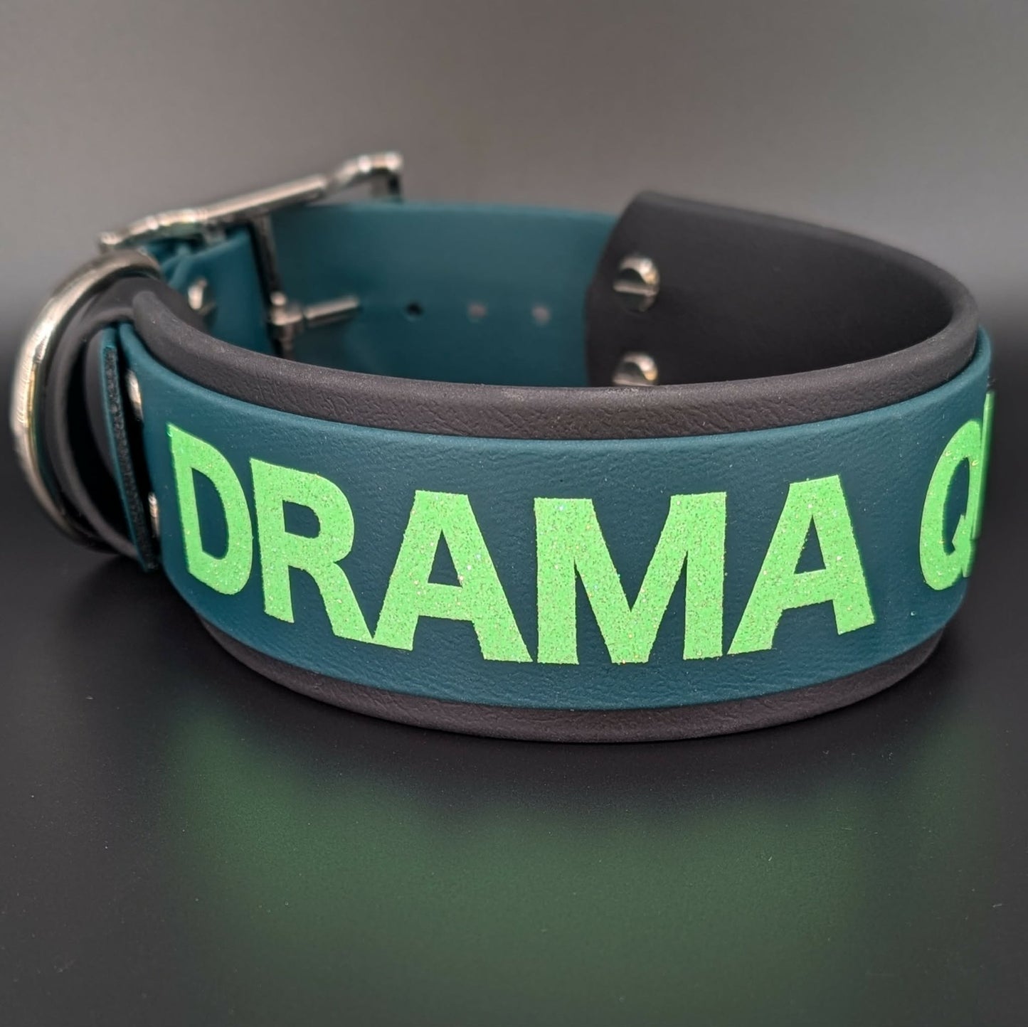 2 inch wide black and dark green layered biothane dog collar with drama queen text