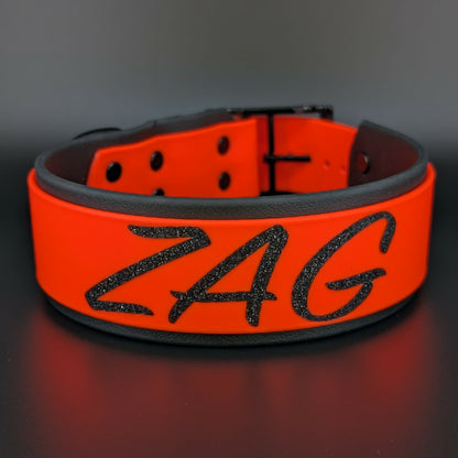 2 inch wide black and orange layered biothane dog collar