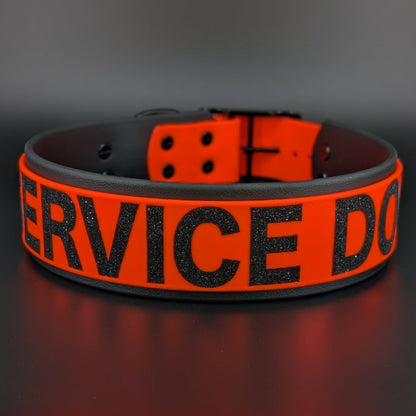 2 inch wide black and orange layered biothane service dog collar