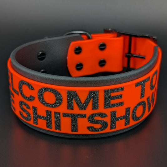 2 inch wide black and orange layered biothane welcome to the shitshow dog collar