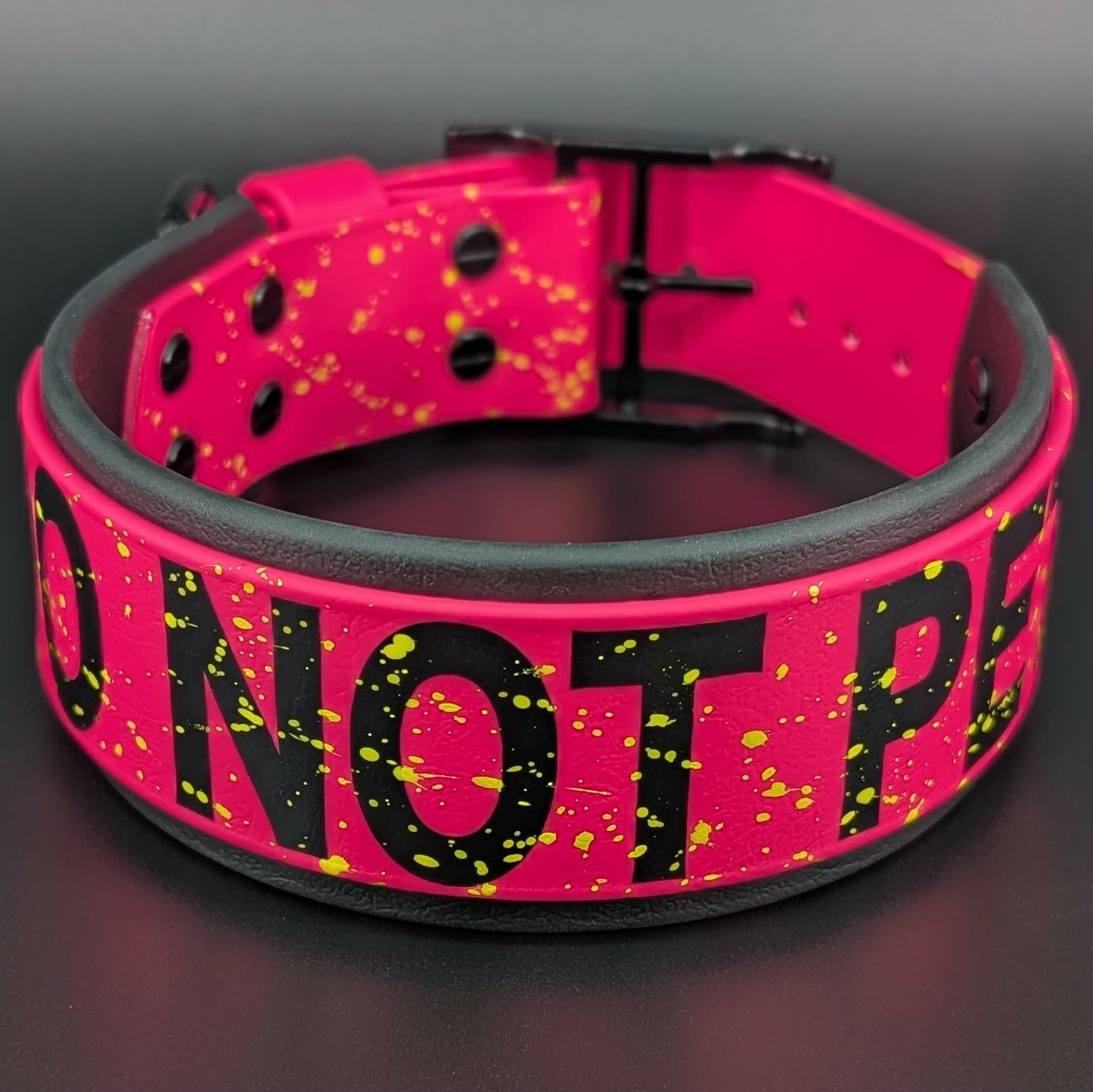 2 inch wide black and pink layered biothane do not pet collar with yellow splatter paint