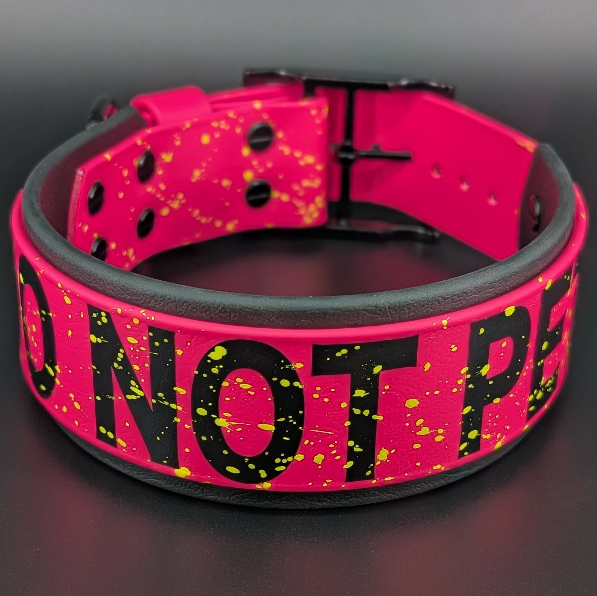 2 inch wide black and pink layered biothane do not pet collar with yellow splatter paint