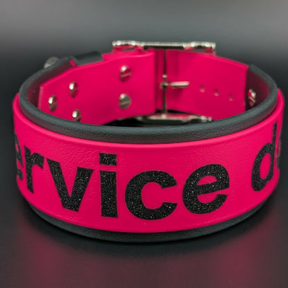 2 inch wide black and pink layered biothane service dog collar with glitter text