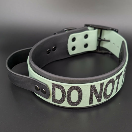 2 inch wide black and sage green layered biothane dog collar with tactical handle and do not pet text