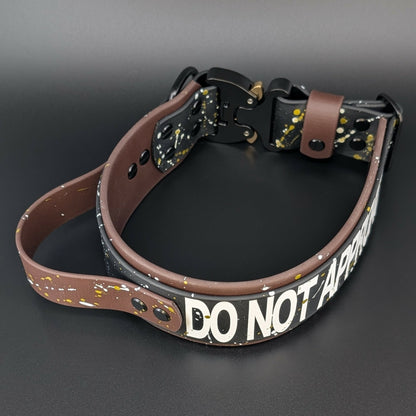 2 inch wide brown and black biothane dog collar with handle and cobra buckle and splatter paint