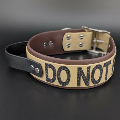 2 inch wide dark brown and tan layered biothane dog collar with black tactical handle and black glitter do not pet text