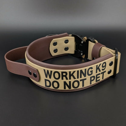 2 inch wide dark brown and tan layered biothane handle collar with quick release cobra buckle and working k9 do not pet text