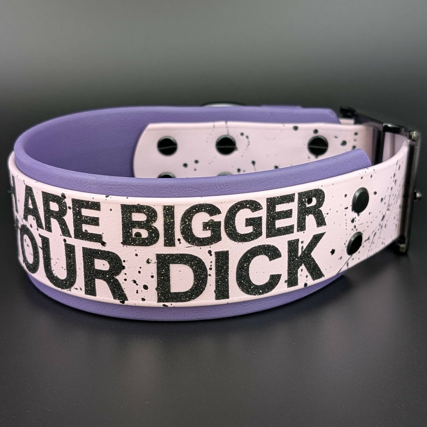 2 inch wide dark purple and lavender biothane my teeth are bigger than your dick collar with splatter paint black hardware