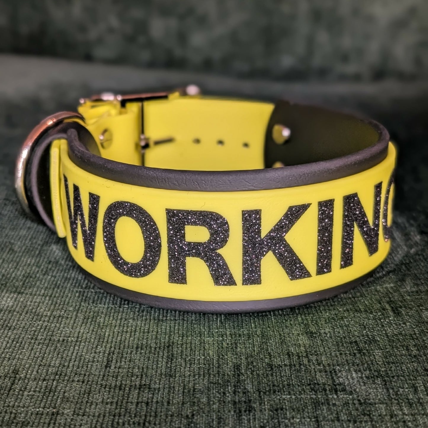2 inch wide black and yellow layered biothane dog collar with black glitter 'WORKING K9' text