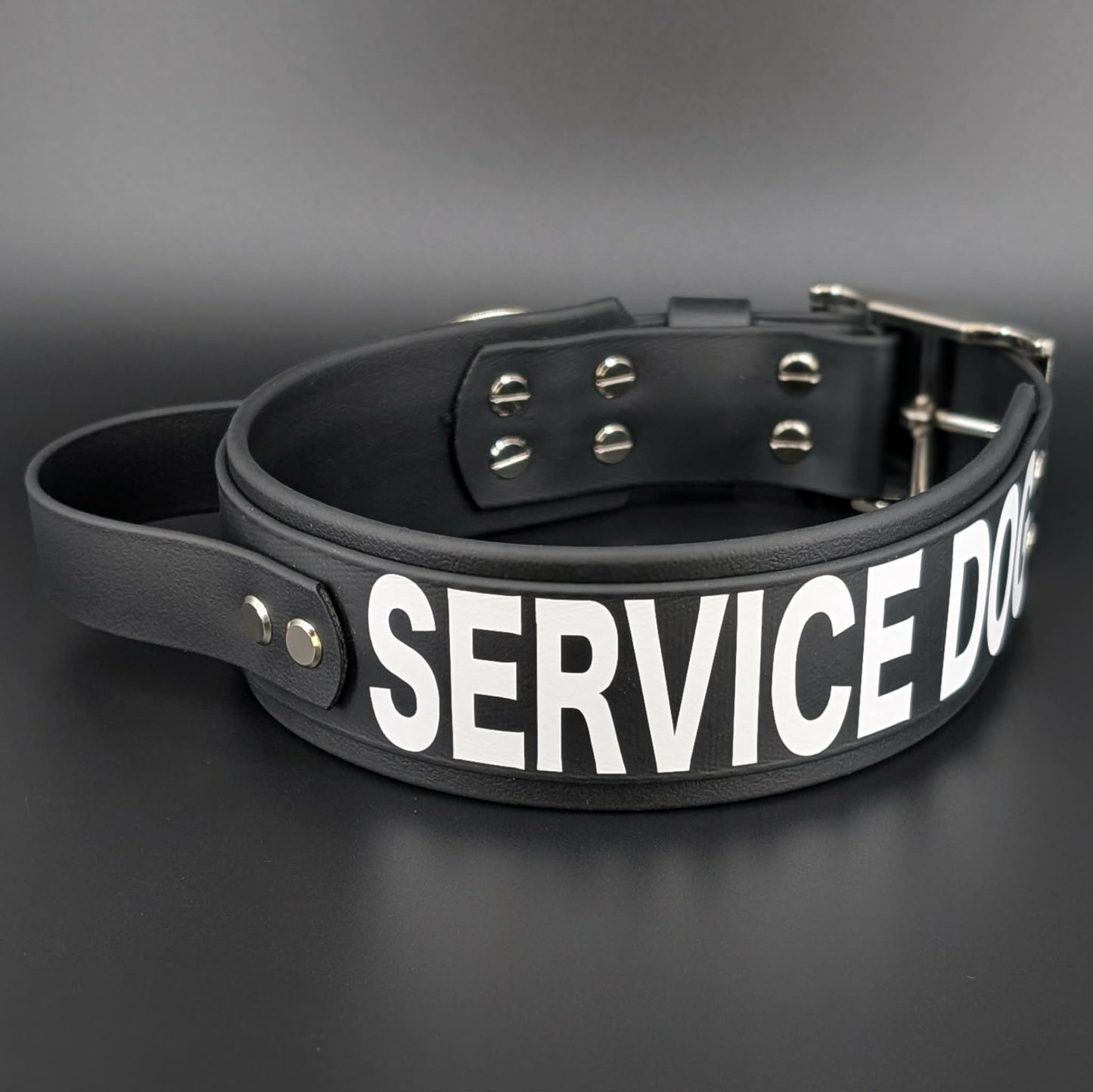 2 inch wide layered black biothane service dog collar with handle