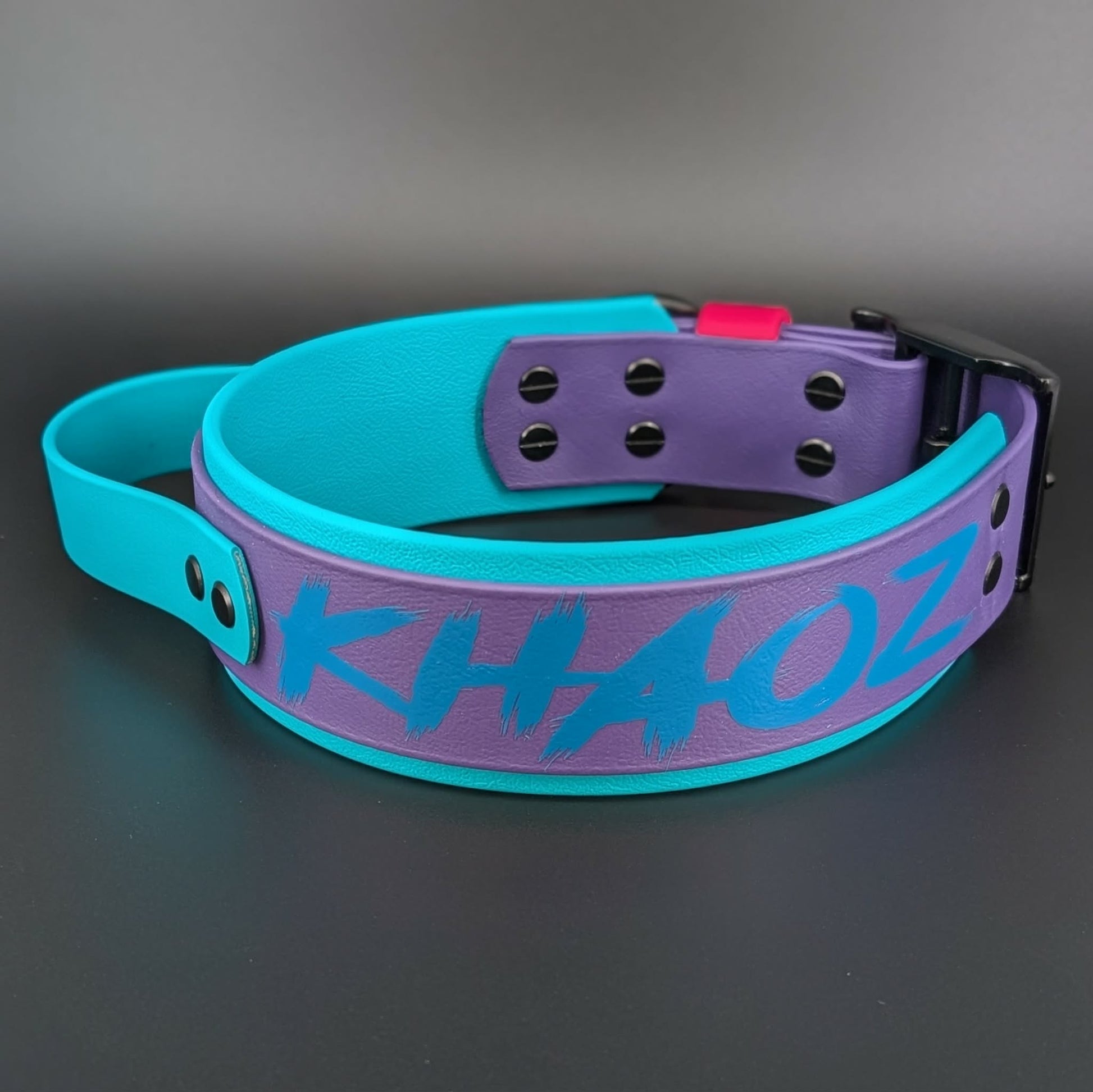 2 inch wide layered teal and dark purple biothane collar with handle and custom text
