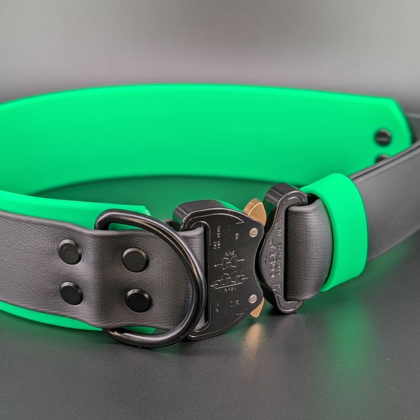 2 inch wide light green and black layered biothane dog collar with heavy duty quick release cobra buckle