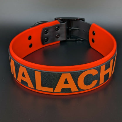 2 inch wide orange and black layered biothane dog collar with custom text