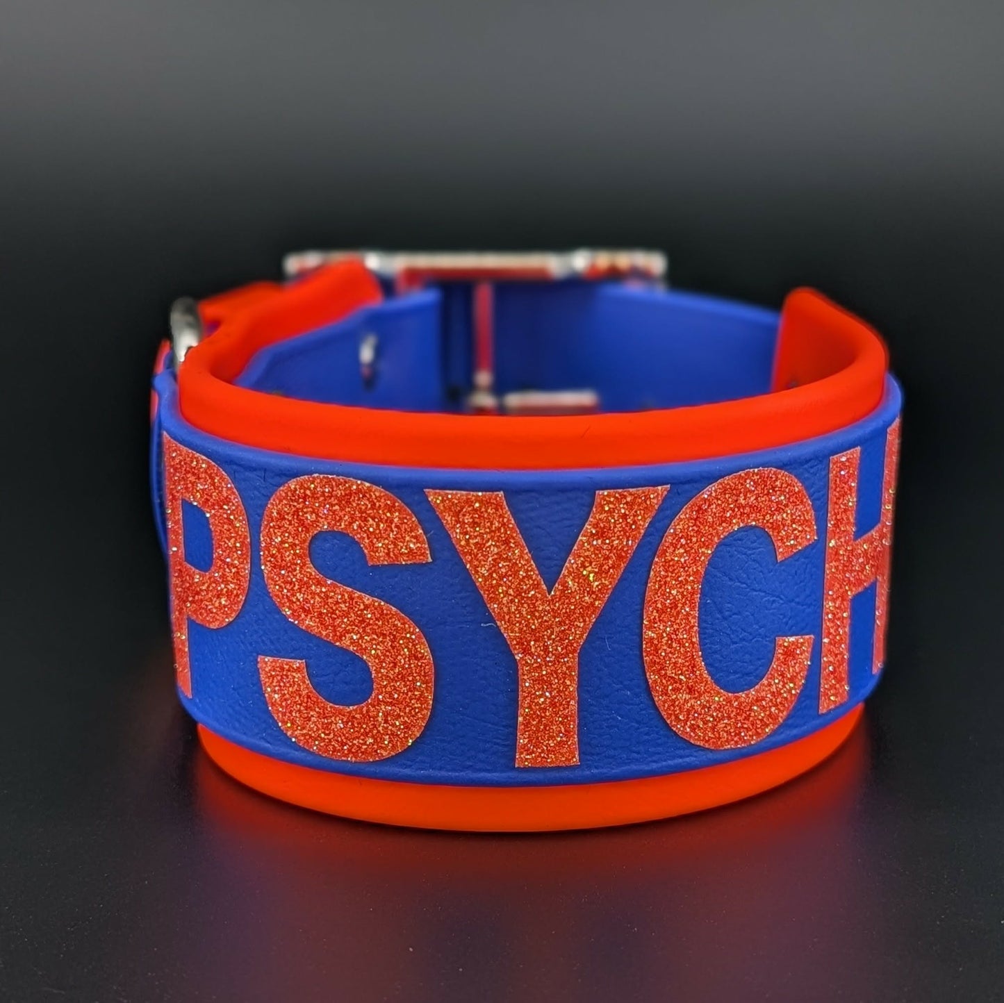 2 inch wide orange and royal blue biothane psycho dog collar