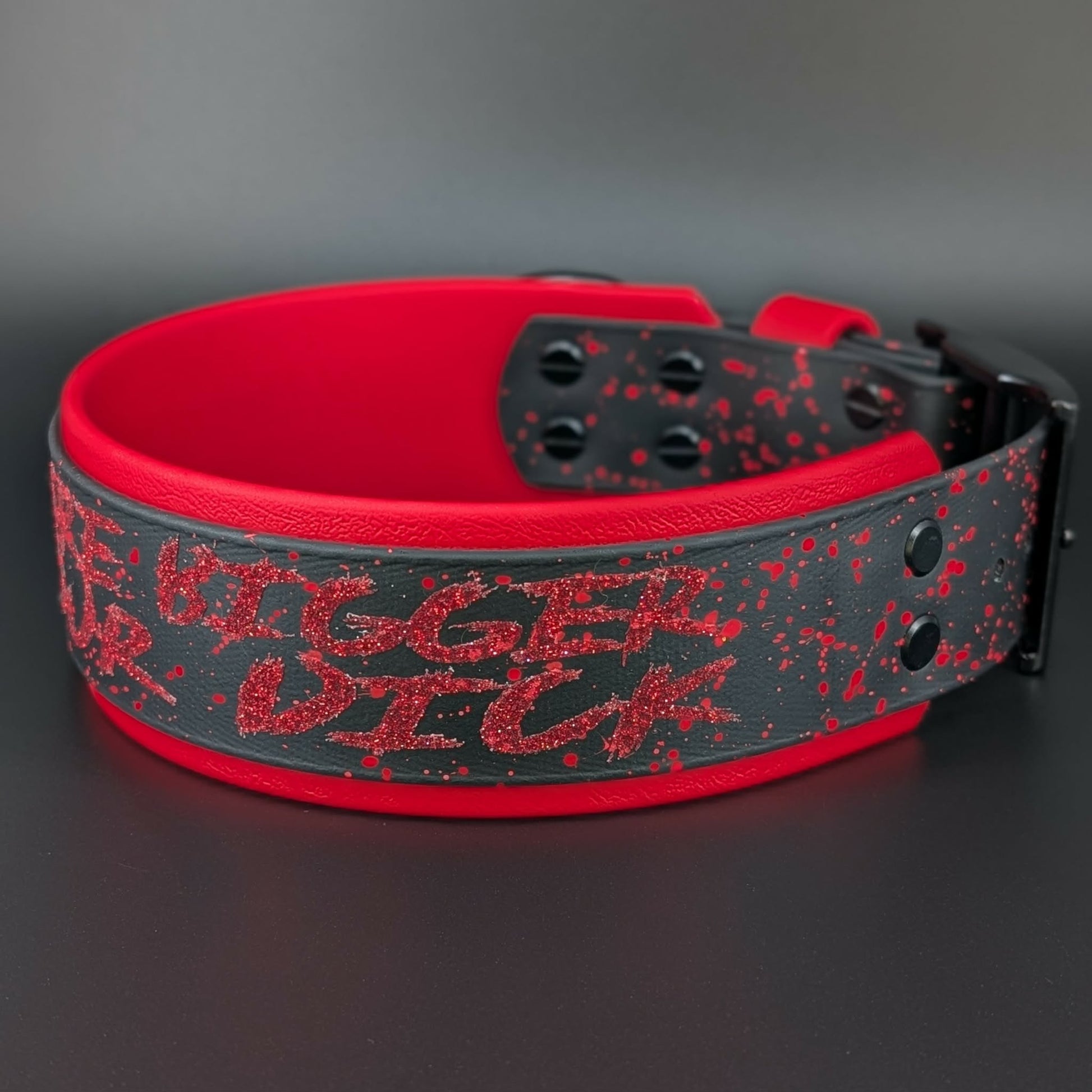 2 inch wide red and black layered biothane dog collar with red splatter paint and glitter my teeth are bigger than your dick text