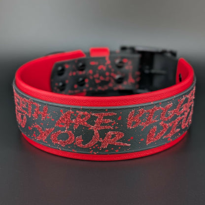 2 inch wide red and black layered biothane dog collar with red splatter paint black hardware and red glitter my teeth are bigger than your dick text