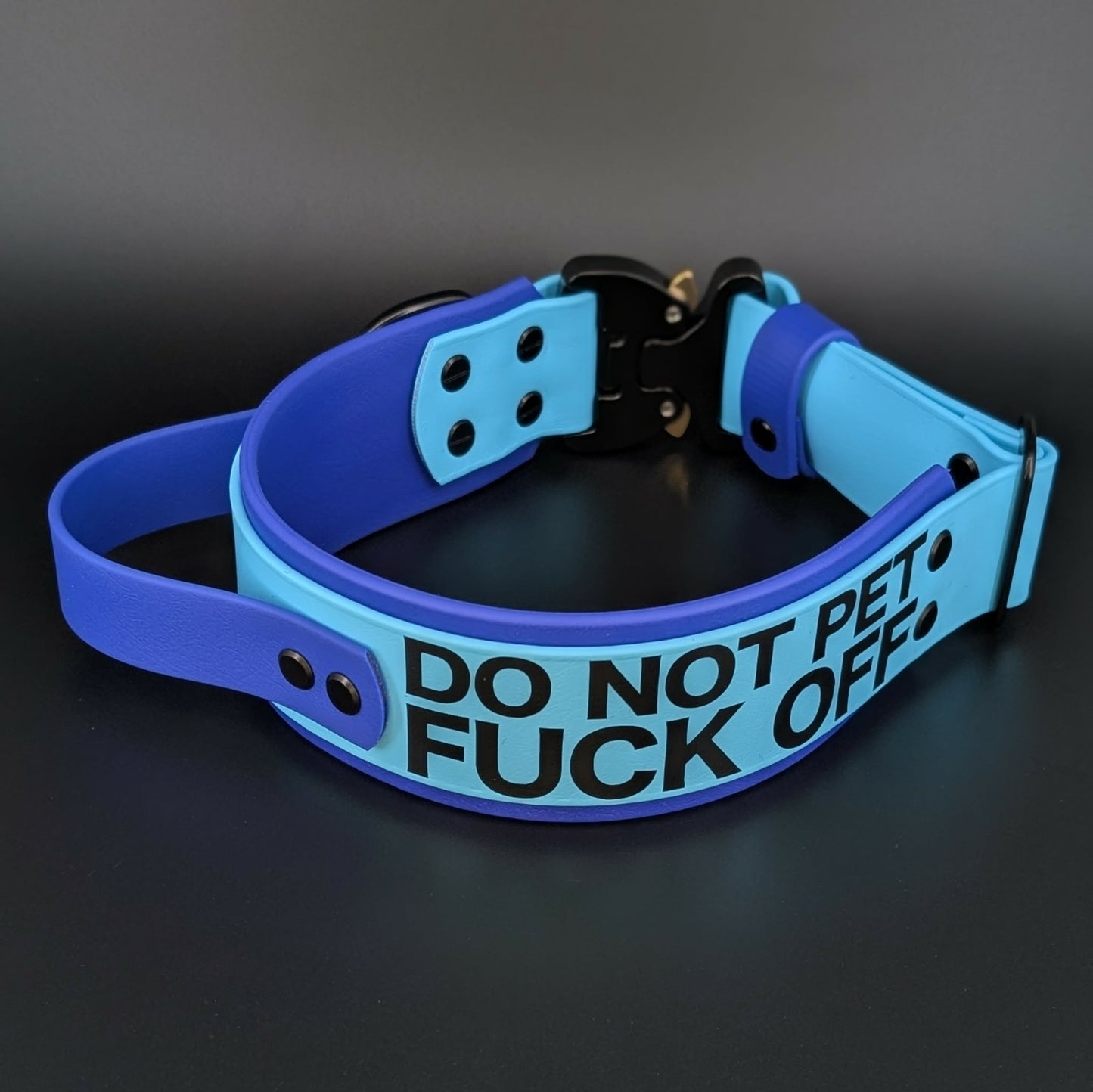 2 inch wide royal blue and light blue layered biothane collar with tactical handle and quick release cobra buckle and do not pet fuck off text