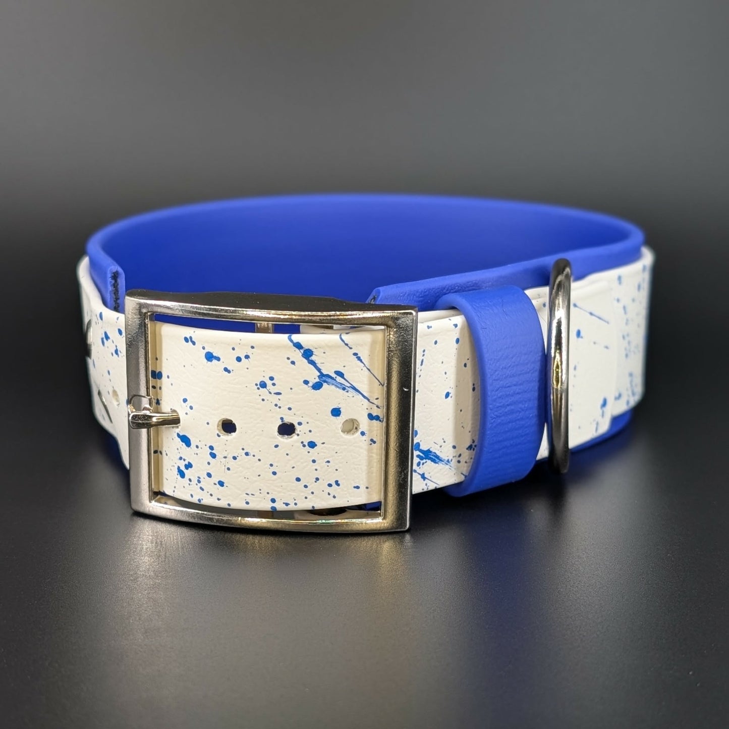 2 inch wide royal blue and white layered biothane dog collar with splatter paint