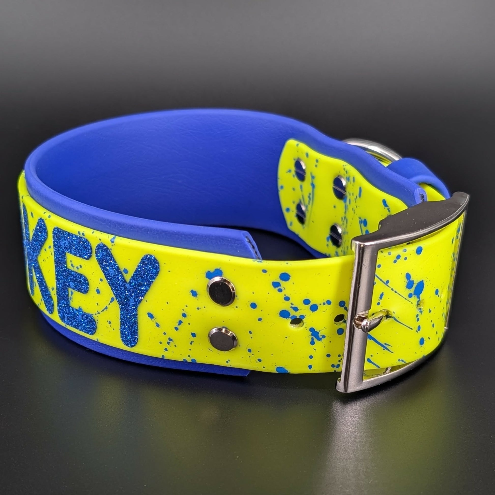 2 inch wide royal blue and- ellow okey dokey dog collar with splatter paint