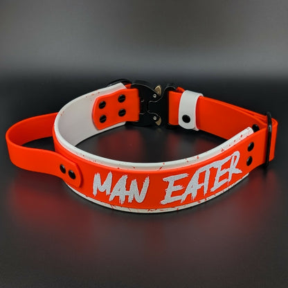 2 inch wide tactical handle collar layered biothane with heavy duty quick release cobra buckle and man eater text