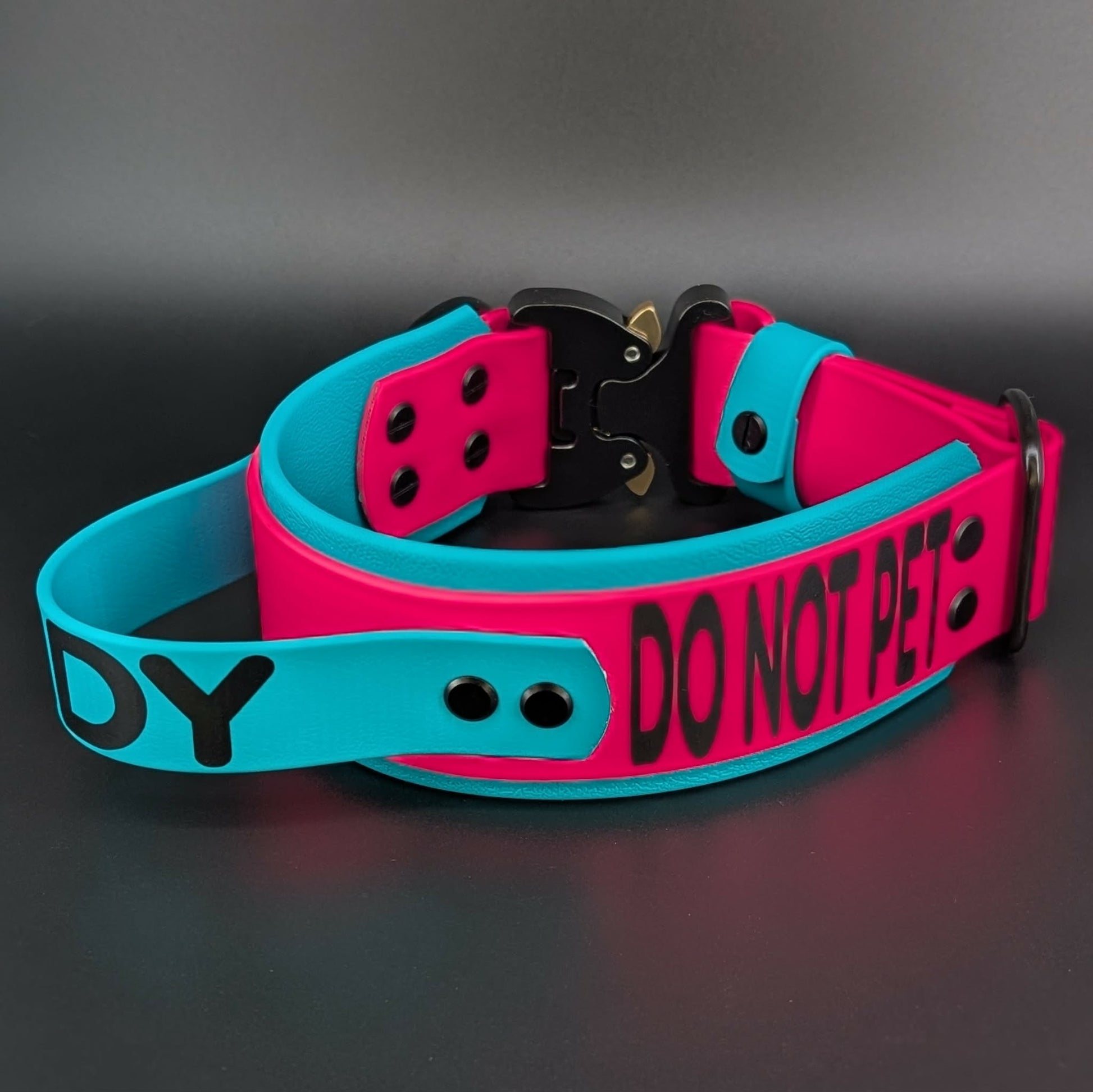 2 inch wide teal and pink tactical handle dog collar with heavy duty quick release cobra buckle and custom text