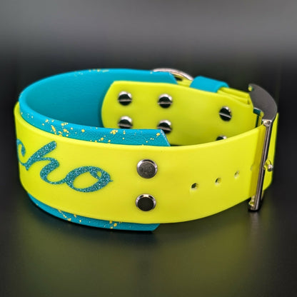 2 inch wide teal and yellow layered biothane dog collar with splatter paint and psycho text