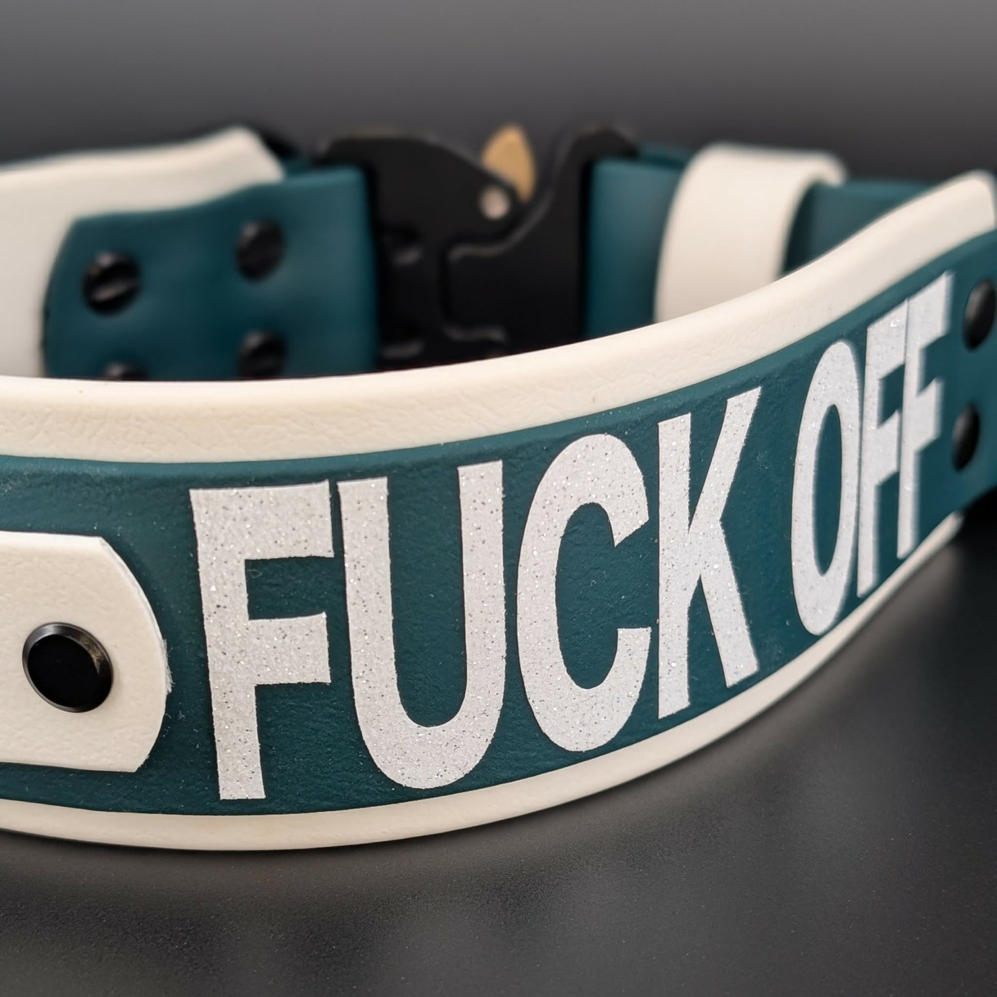 2 inch wide white and dark green layered biothane collar with tactical handle and cobra buckle and fuck off glitter text