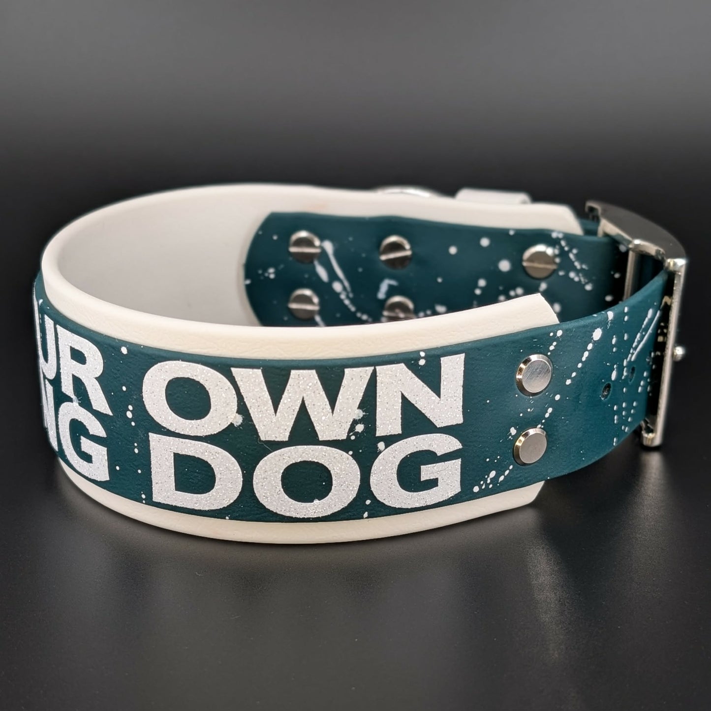2 inch wide white and dark green layered biothane pet your own fucking dog collar with splatter paint and silver hardware