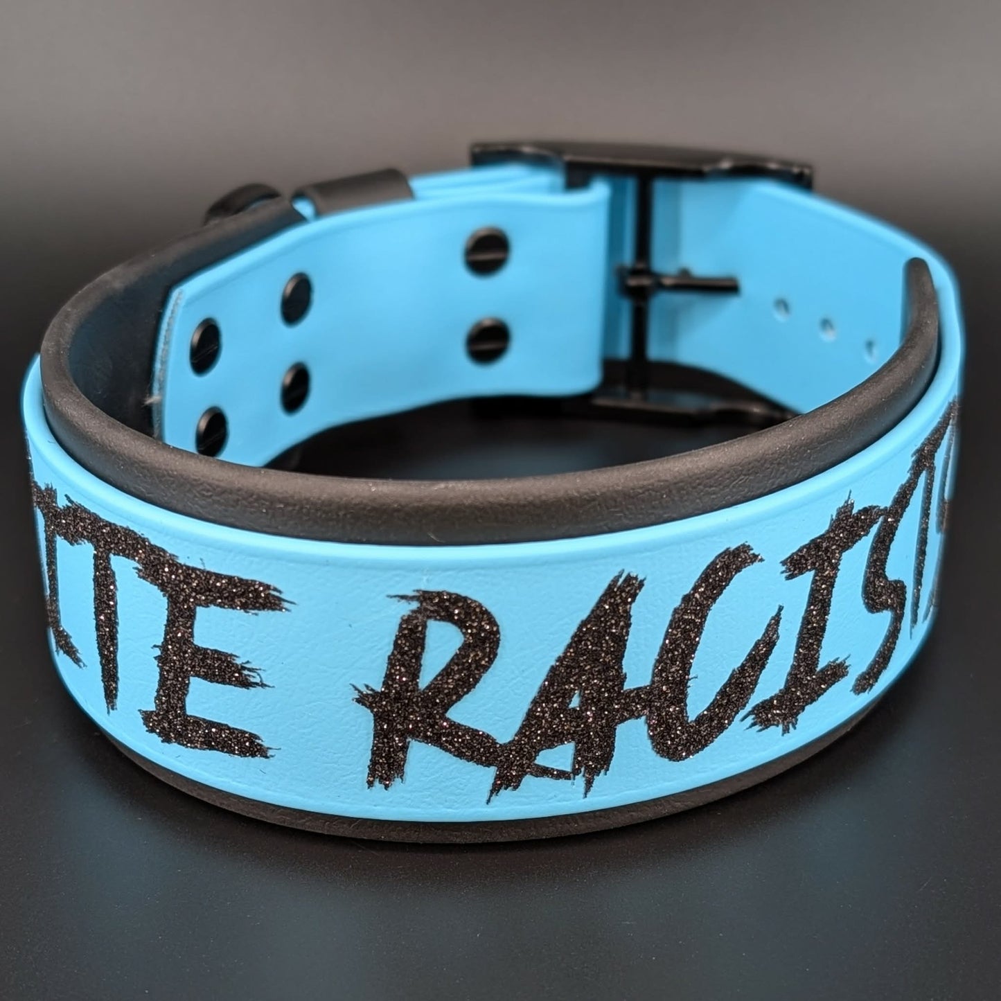 I bite racists dog collar 2 inch wide black and light blue biothane