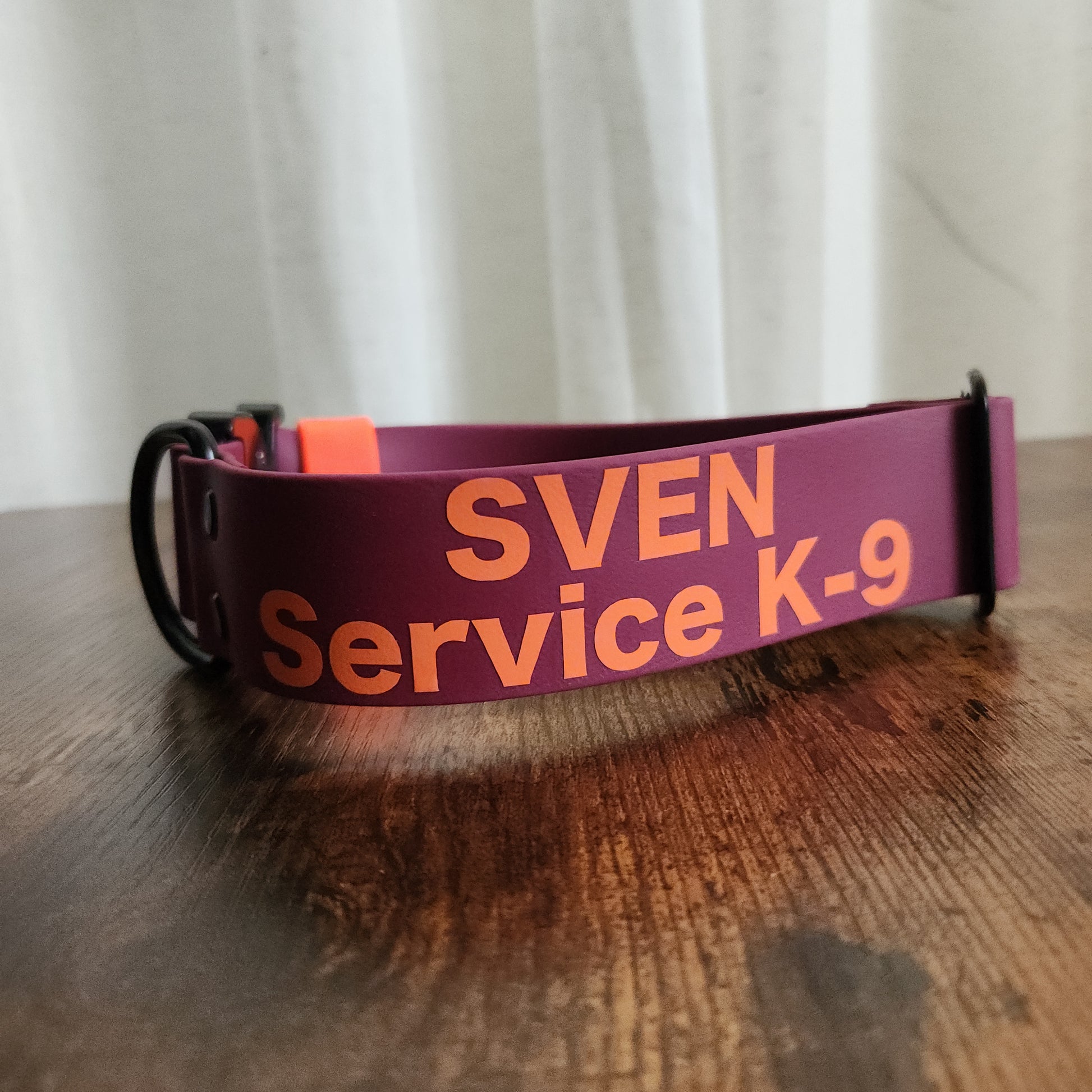 1.5 inch wide biothane dog collar with heavy duty cobra buckle and custom text reading SVEN Service K-9