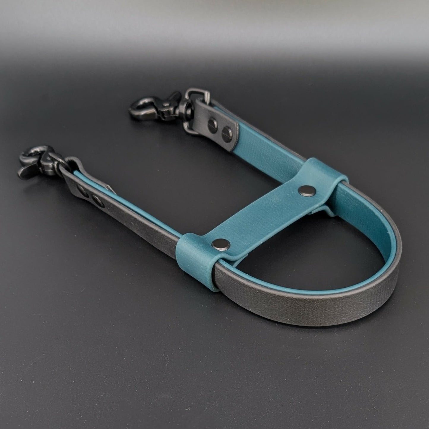 black and dark green layered biothane pull strap for forward momentum pulling service dog