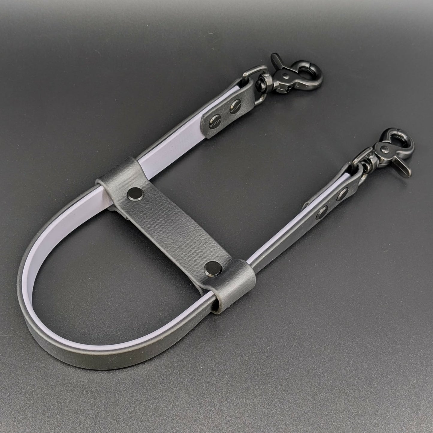 black and gray layered biothane pull strap with black hardware