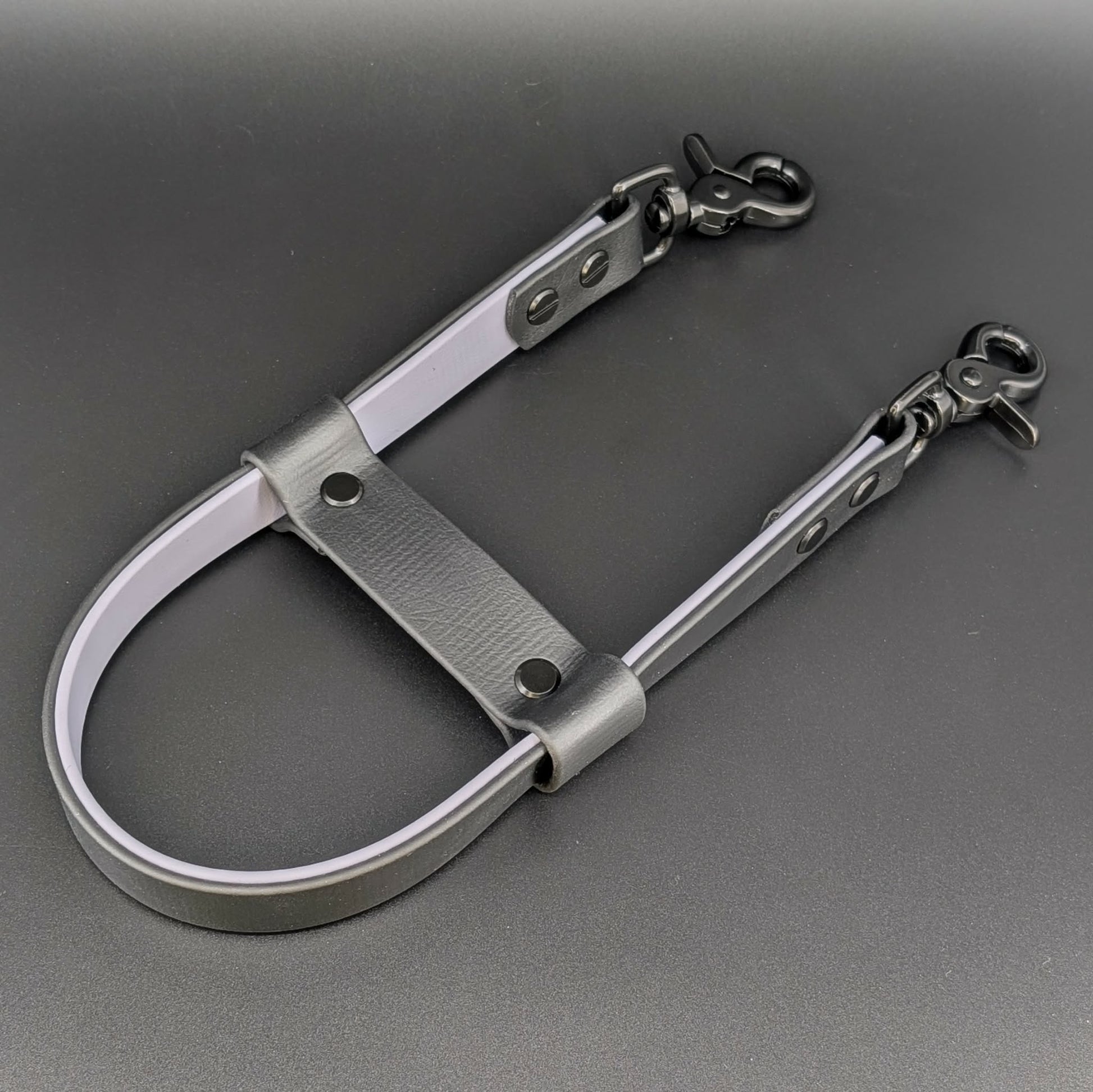 black and gray layered biothane pull strap with black hardware