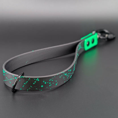 black and green biothane traffic handle with carabiner clip and splatter paint