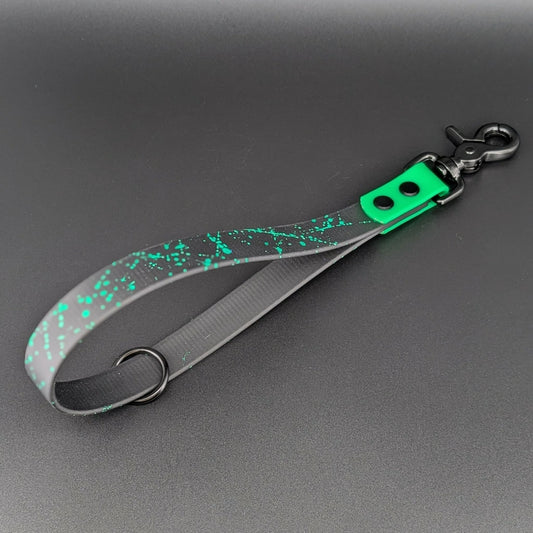 black and light green biothane traffic handle with green splatter paint and floating o ring