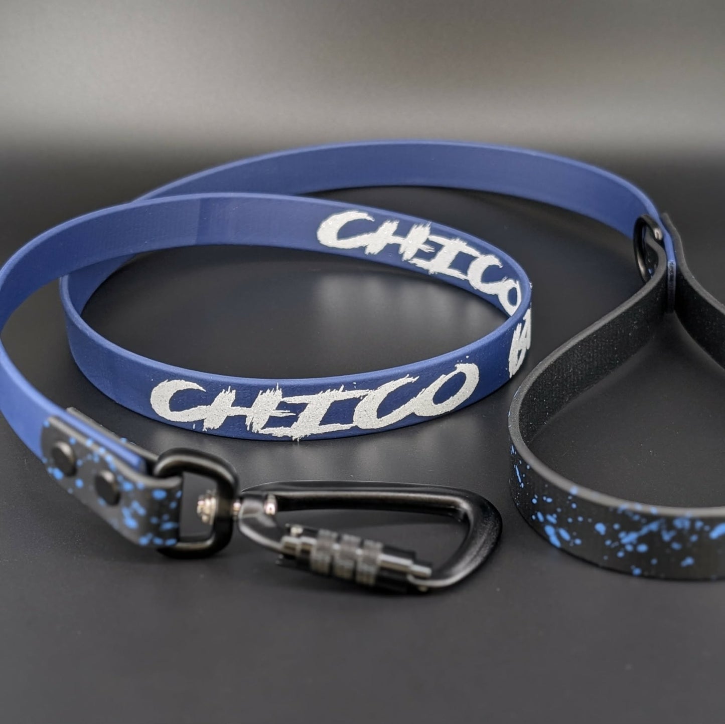 black and navy blue biothane dog leash with navy blue splatter paint and custom text