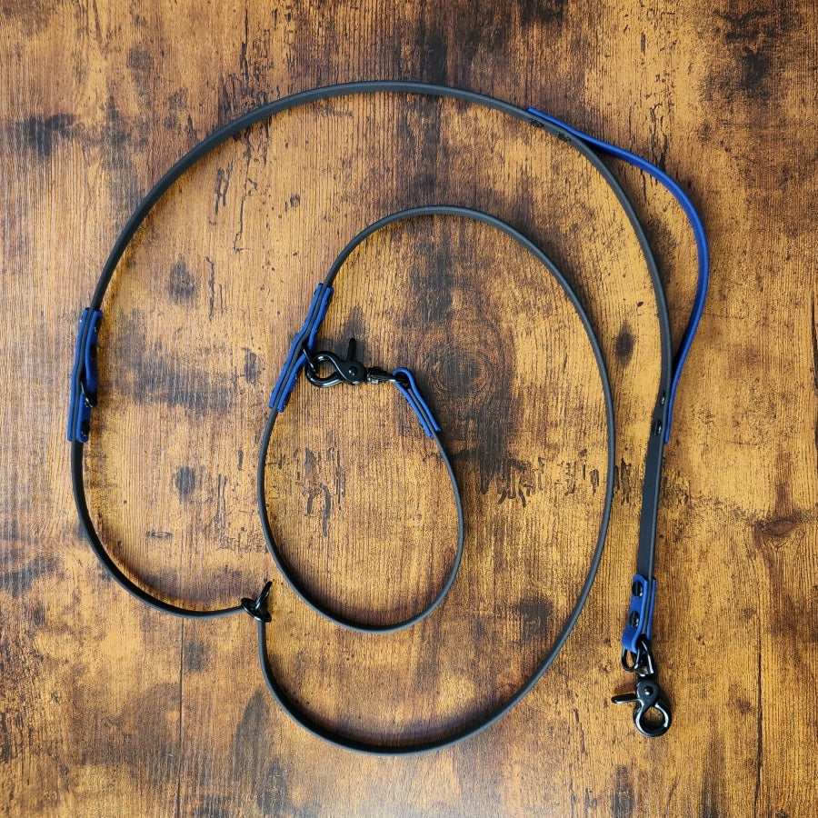 black and avy blue biothane hands free leash with built in traffic handle