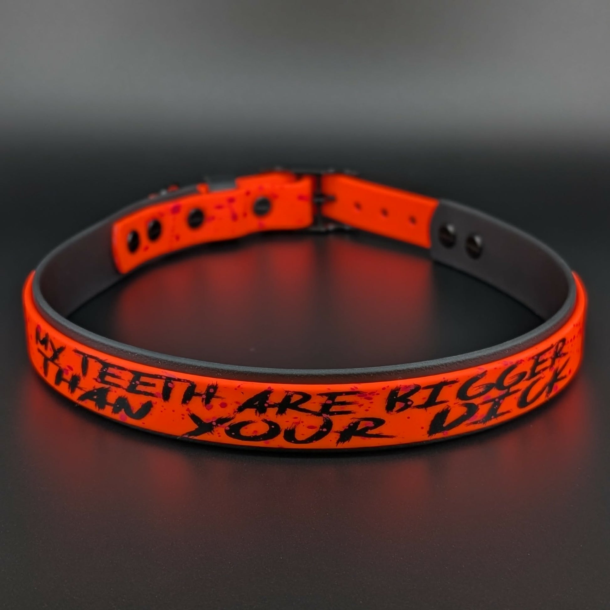 black and orange layered biothane my teeth are bigger than your dick collar with splatter paint