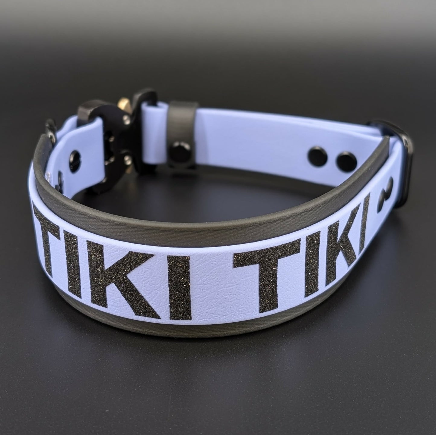 black and periwinkle blue layered biothane dog collar with quick release cobra buckle and custom text
